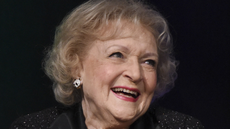 Betty White laughs