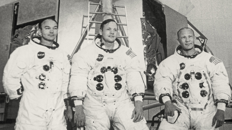 apollo 11 crew pose for photograph
