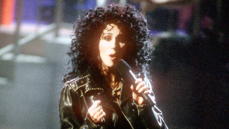Cher performs on a battleship