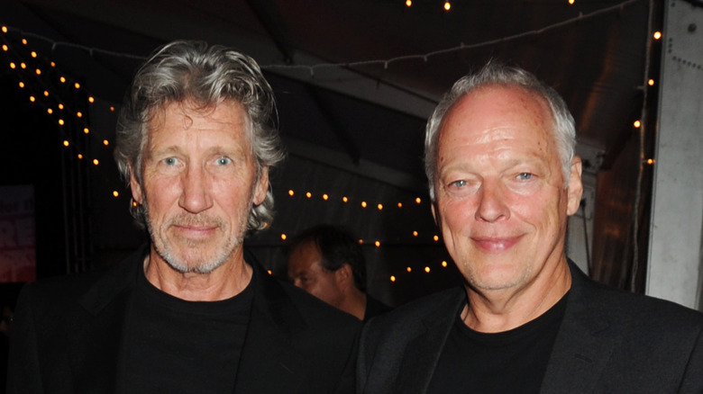 David Gilmour and Roger Waters grinning