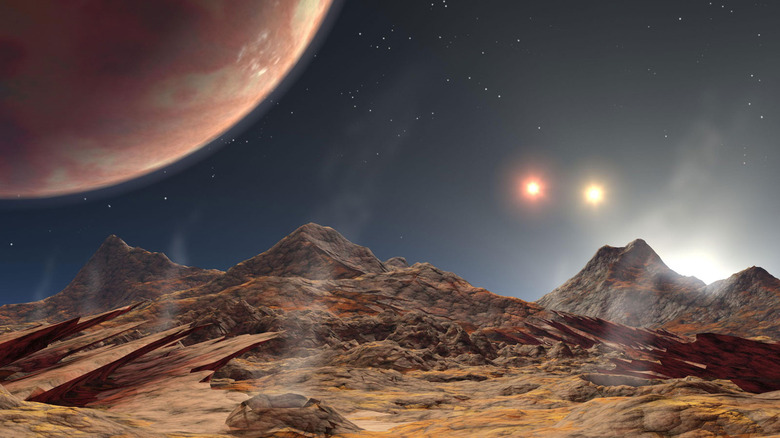 Binary sunset on an alien planet.