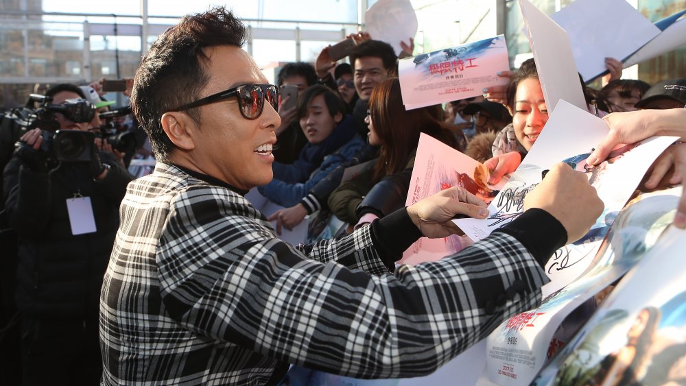 Donnie YEn, international badass, signing autographs