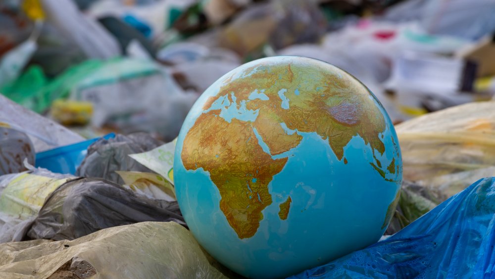 earth globe in garbage