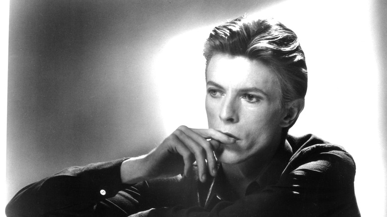 David Bowie finger to lips