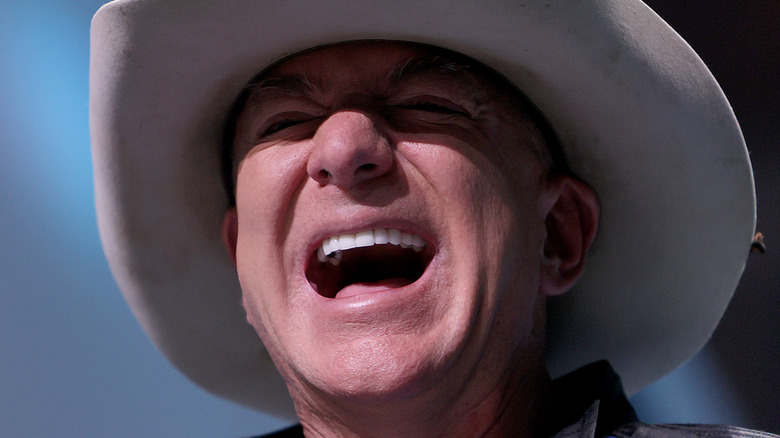 Cowboy Bezos laughing