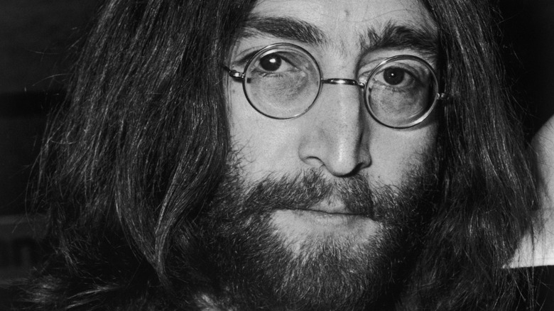 John Lennon wearing glasses