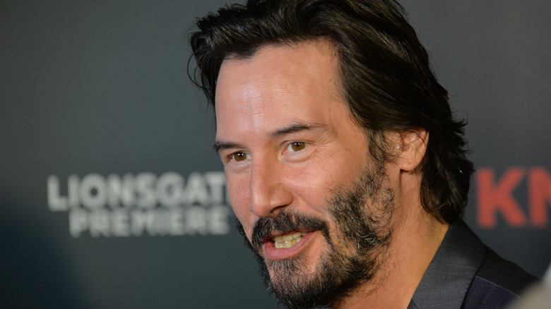 Keanu Reeves smiling