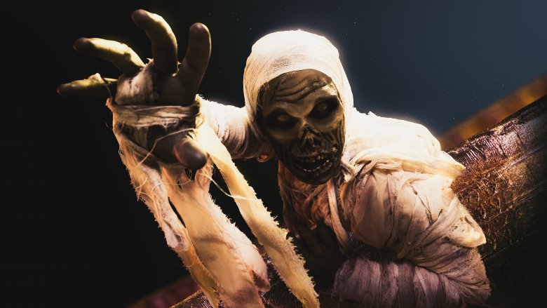 egyptian mummy with hand out