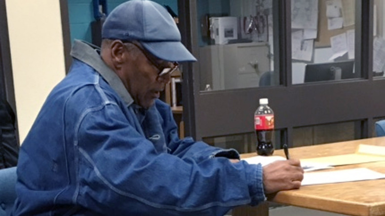 OJ signs paperwork