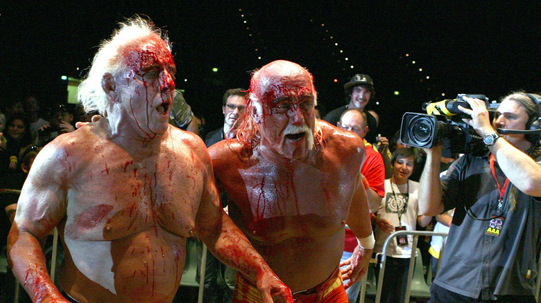 Ric Flair and Hulk Hogan bleeding from their faces