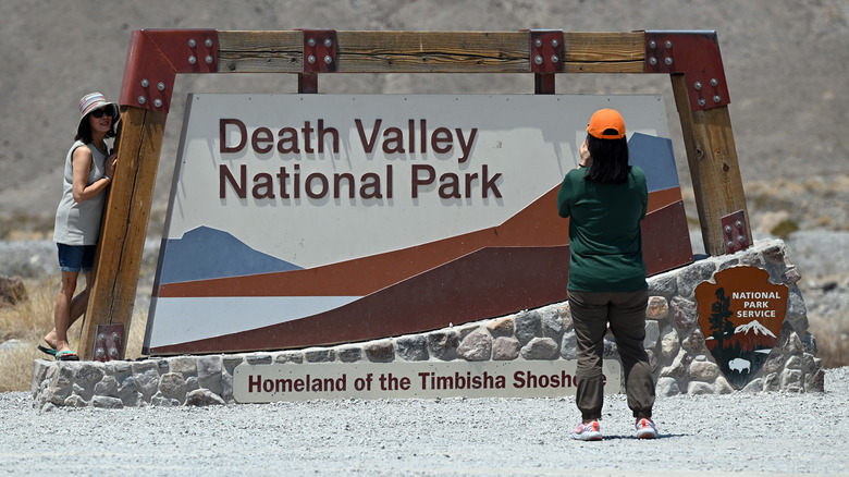 a sign welcomes visitors to Death Valley National Park