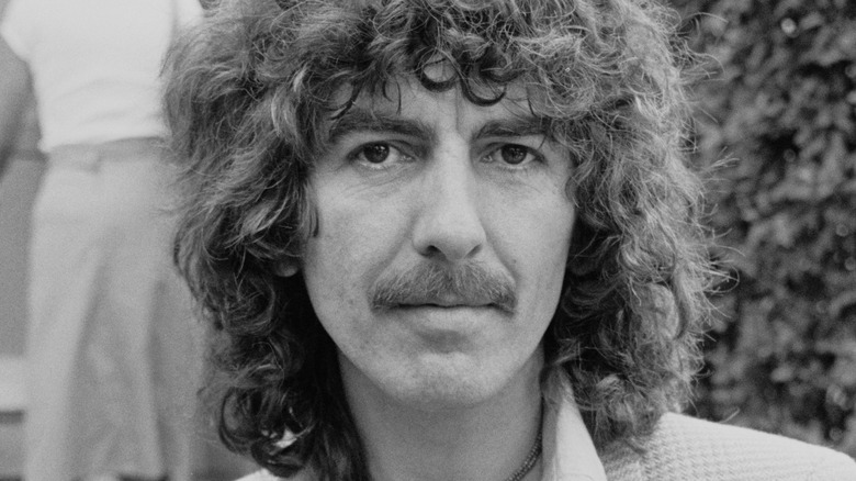 George Harrison with mustache