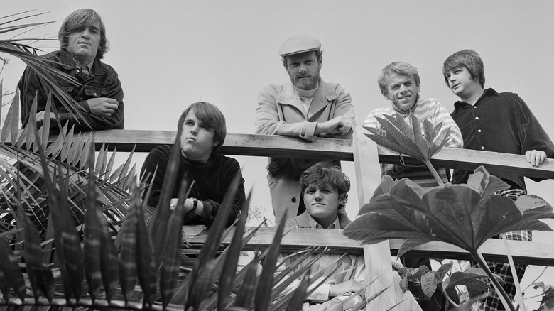 Beach Boys posing near bridge
