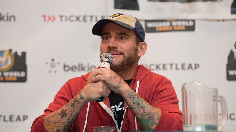 CM Punk red shirt mic