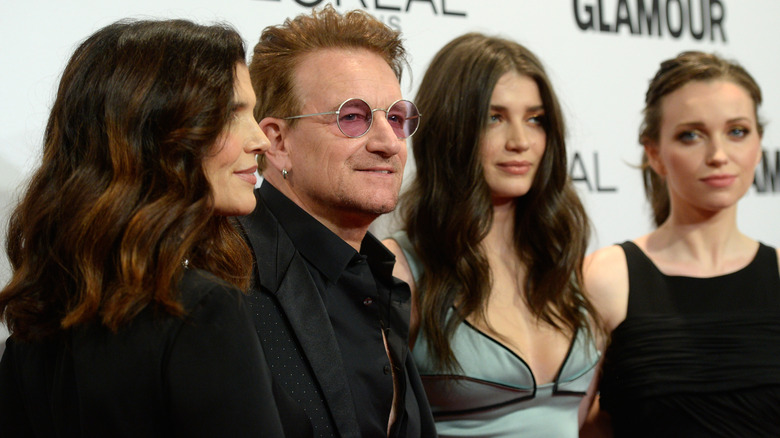 Bono and his wife and daughters