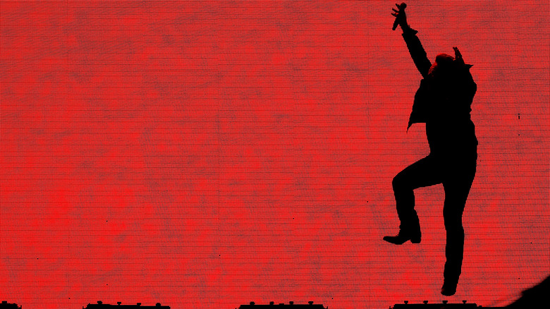 Bono performing on stage