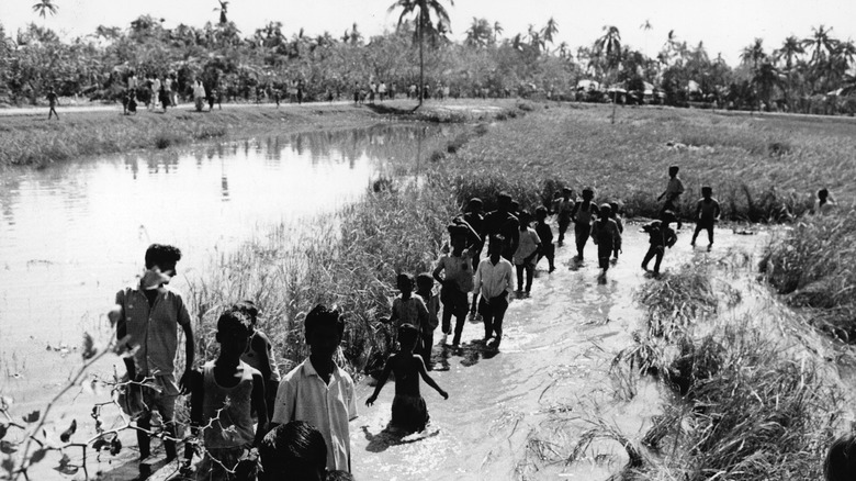 Children in floodwater after Bhola cyclone