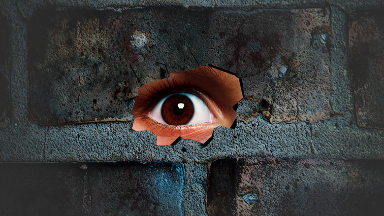 Eye looking through a wall