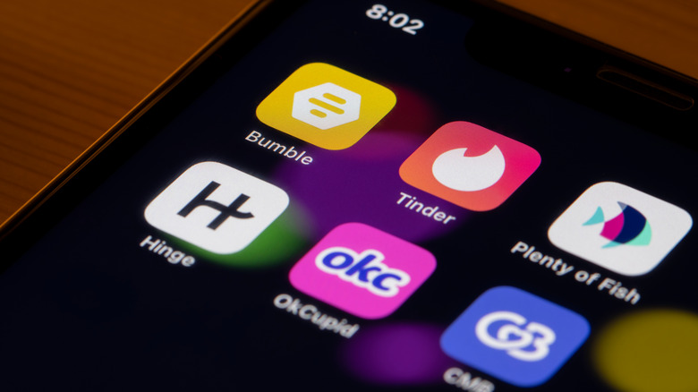 Dating app logos on phone