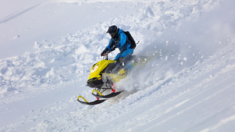 Man riding a snowmobile