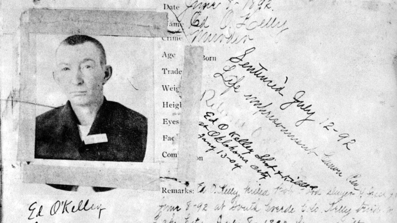 Blotter sheet of Ed O'Kelley with handwritten notes on his crime