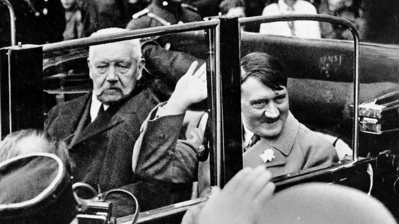 adolf hitler riding in a car