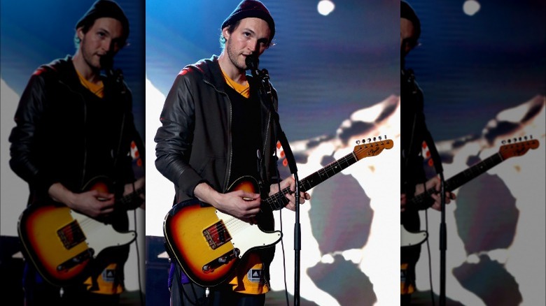 John Frusciante holding guitar
