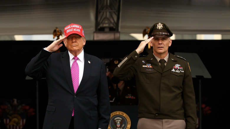 Donald Trump and military personnel saluting