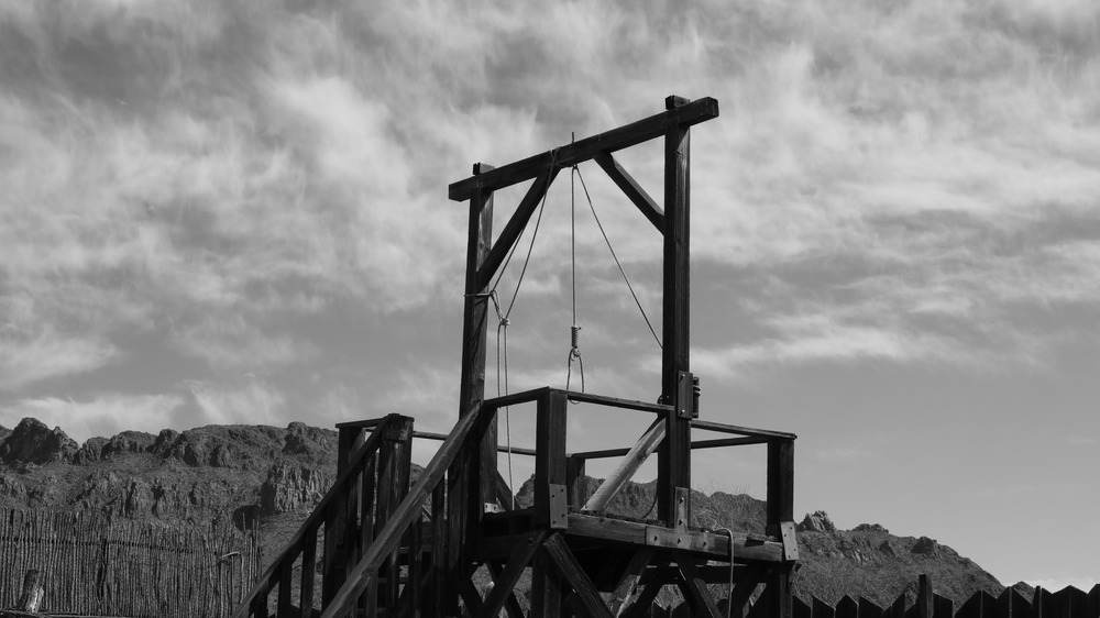 Gallows underneath a cloudy sky