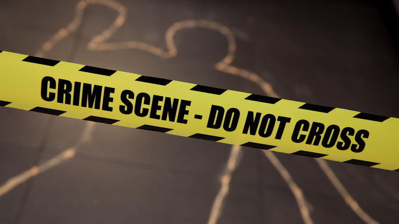 crime tape chalk outline