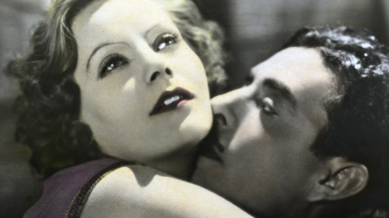 John Gilbert kisses Greta Garbo