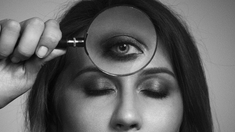 Third eye under magnifying glass