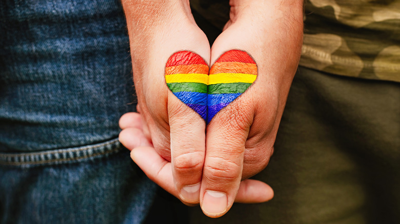 Gay couple holding hands