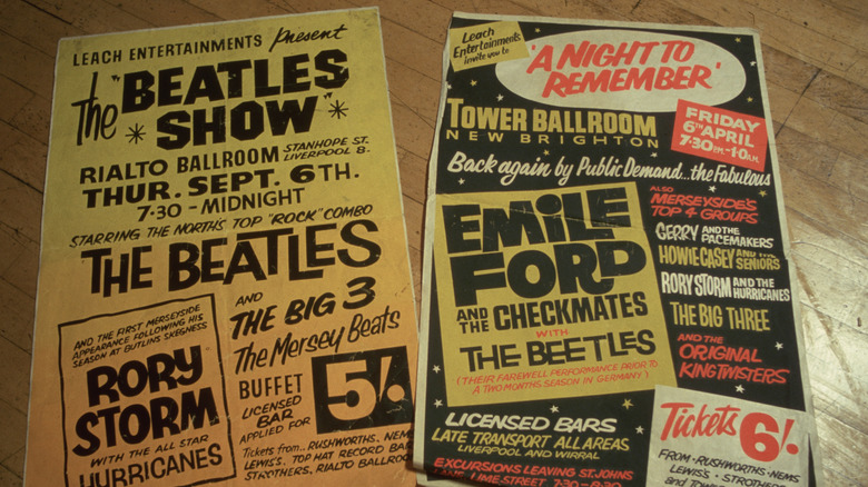 A photo of two vintage concert posters.