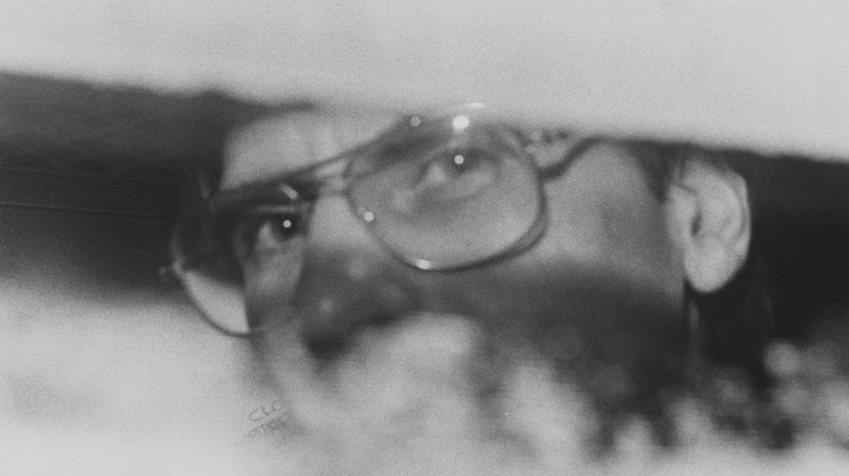 Dennis Nilsen in a police van 1983