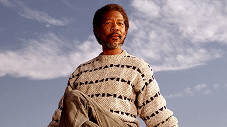 Morgan Freeman crosses legs