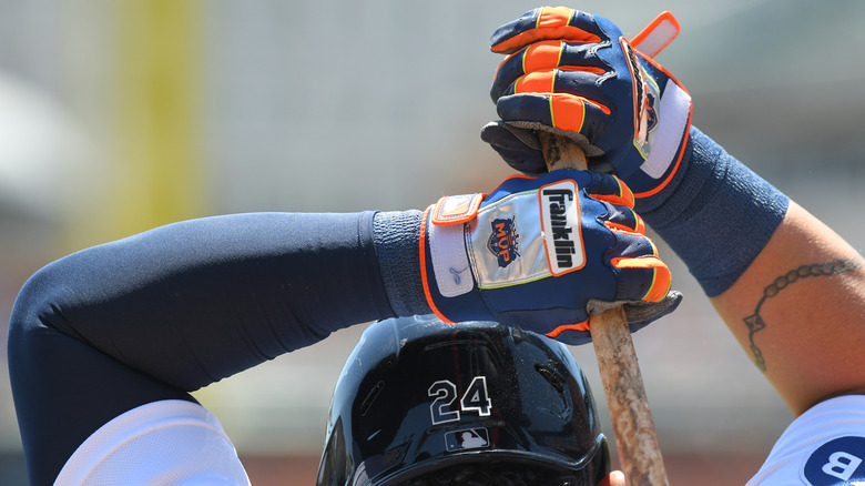 Baseball player wearing batting gloves