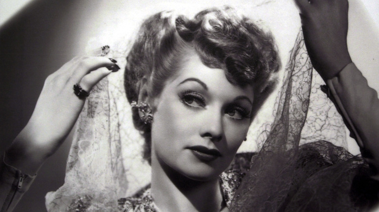 Lucille Ball dons a veil