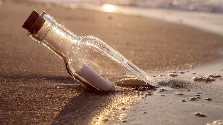 a bottle on the sand