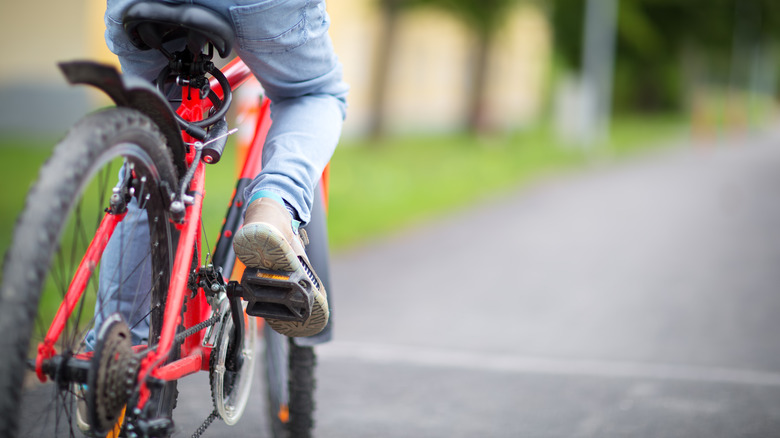 kid riding bicycle
