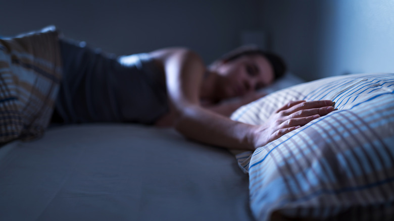 person in bed