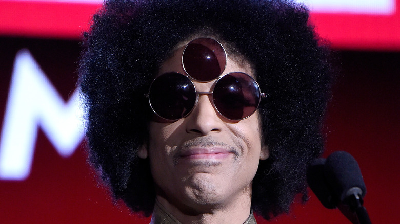 Prince wearing three-lens sunglasses