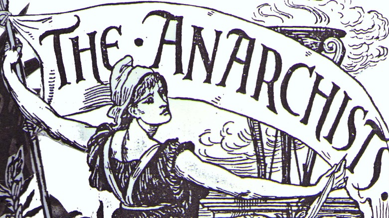 Woman with sign that says The Anarchists