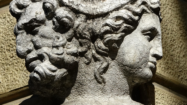 The two-faced statue of Janus on the corner of Palazzo Magnani
