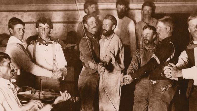 Men dancing in the 1800s