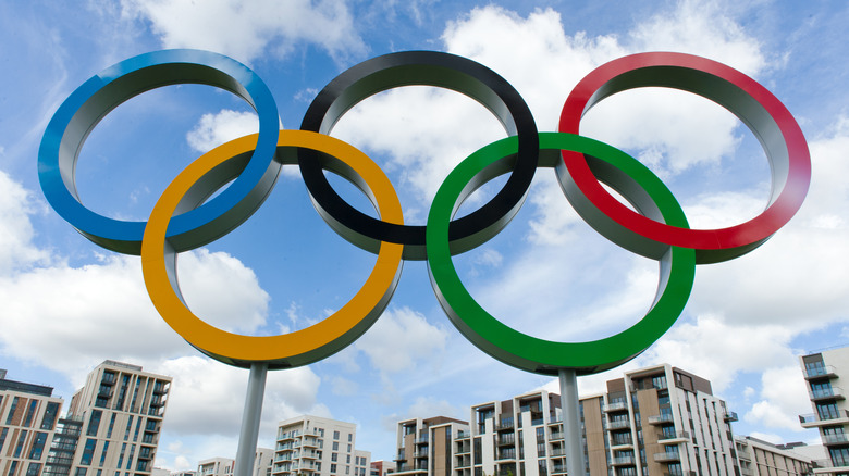 Olympic rings in front of Olympic village