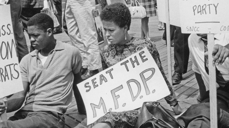Demonstrators and placards in support of the MFDP