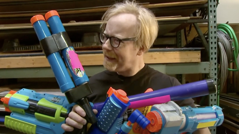 Adam Savage holding water guns on MythBusters