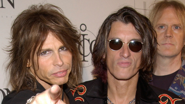 Aerosmith posing for camera