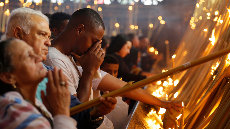 People praying at mass